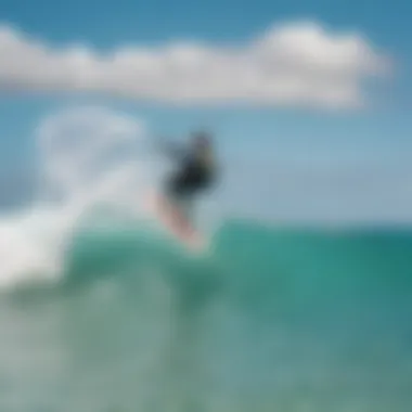 Kitesurfers enjoying the waves in turquoise waters