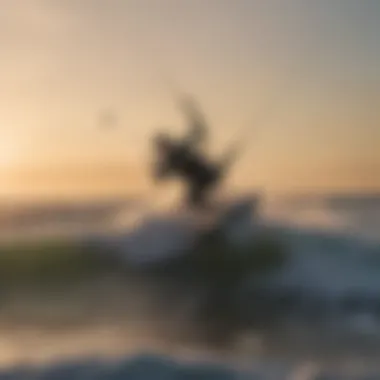 Kitesurfers riding the waves at sunset