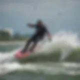 Dynamic kiteboarder skillfully navigating challenging waves