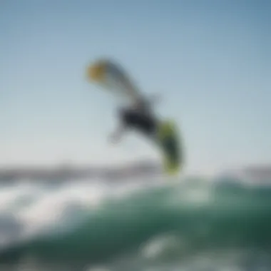 Dynamic image of a kiteboarder soaring above the waves