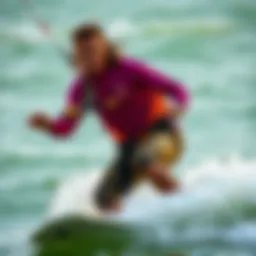 A kiteboarder showcasing a vibrant long sleeve wet shirt while riding the waves.
