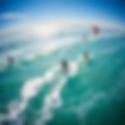 Aerial Perspective of Kiteboarders in Action An aerial view of kiteboarders gliding over turquoise waters