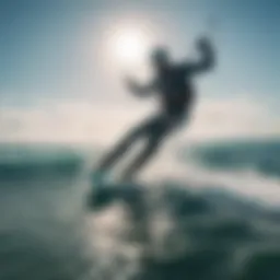 A kitesurfer gliding across vibrant blue waves under a clear sky