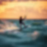 Dramatic sunset view of kiteboarding in action