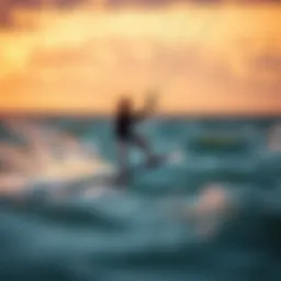 Dramatic sunset view of kiteboarding in action