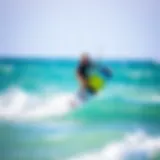 A vibrant Mystic Kiteboard gliding over the waves