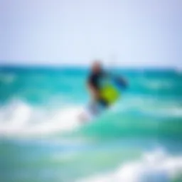 A vibrant Mystic Kiteboard gliding over the waves