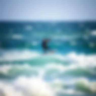 Kiteboarder riding the Ocean Rodeo Mako in varied conditions demonstrating performance