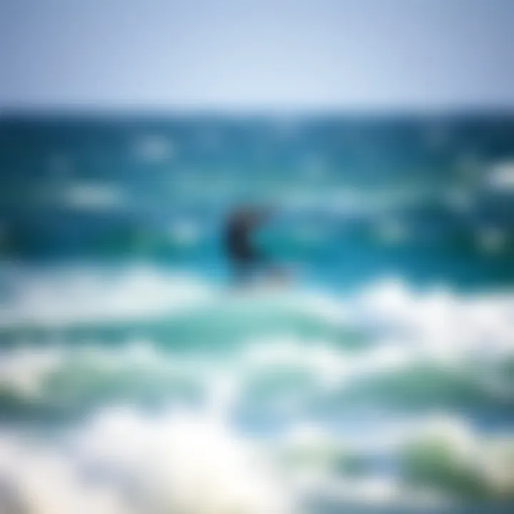 Kiteboarder riding the Ocean Rodeo Mako in varied conditions demonstrating performance