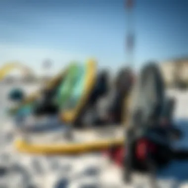 Kiteboarding equipment neatly arranged on the beach
