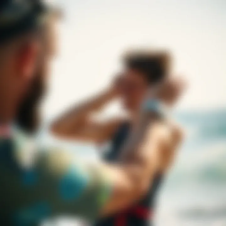 Kiteboarder adjusting Stryder straps for optimal fit