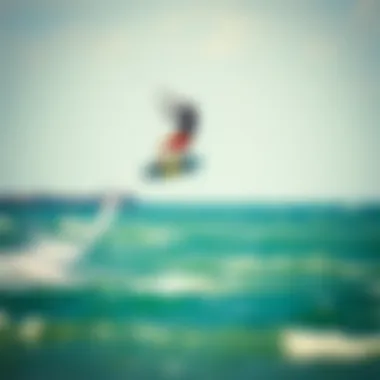 Kiteboarder in Action with Carbon Fibre Mast Kiteboarder performing an aerial maneuver with carbon fibre mast in action
