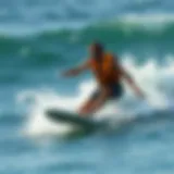 Surfer Riding a Wave in Flotation Vest A surfer wearing a flotation vest riding a wave