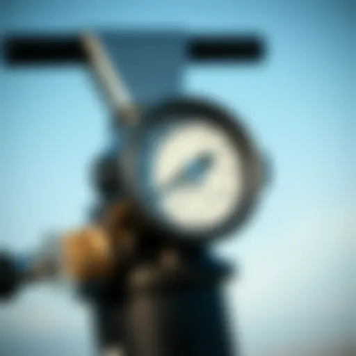 Close-up view of a high-pressure kite pump showcasing its nozzle and gauge.