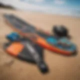 Beginner kiteboarding gear laid out on a sandy beach