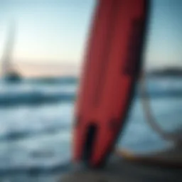 A sleek efoil board displayed at the beach