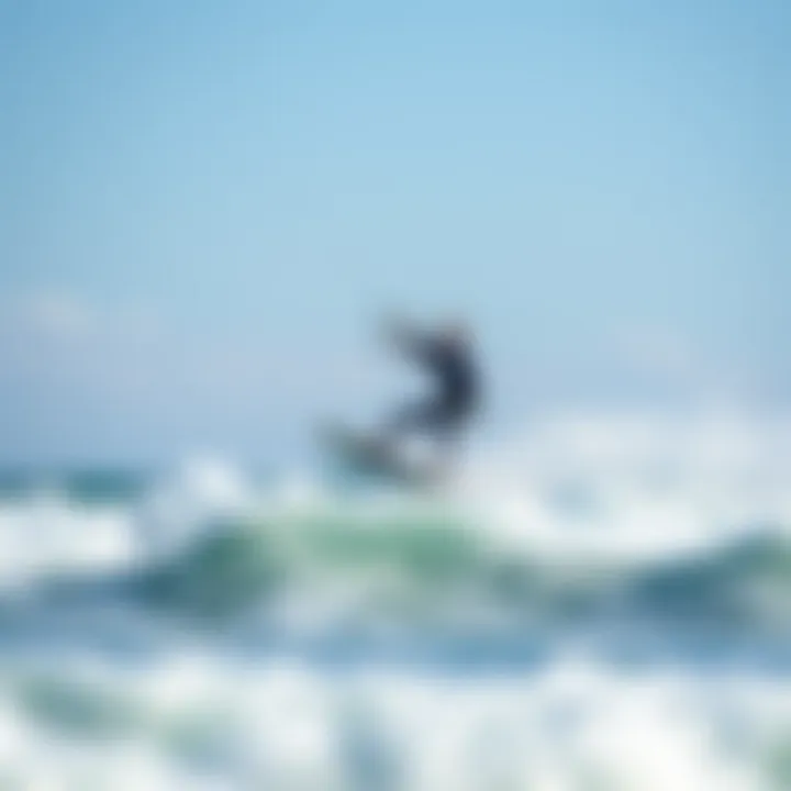 Kitesurfing in Action A kitesurfer gliding over the waves