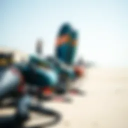 Kitesurfing equipment laid out on the beach
