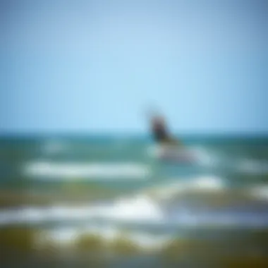 Kiteboarding in Ideal Conditions Kiteboarder enjoying the wind and waves in Benton Harbor