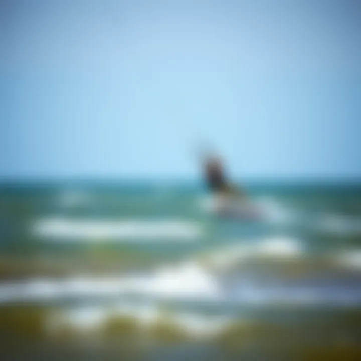 Kiteboarding in Ideal Conditions Kiteboarder enjoying the wind and waves in Benton Harbor