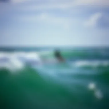 Kiteboarder navigating ocean waves during favorable weather