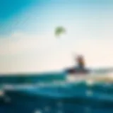 Kiteboarder soaring through the air with a vibrant kite against the ocean backdrop