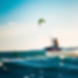 Kiteboarder soaring through the air with a vibrant kite against the ocean backdrop
