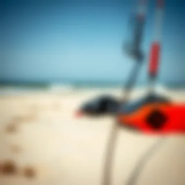 Close-up of kiteboarding equipment on the sandy shore of West Dennis