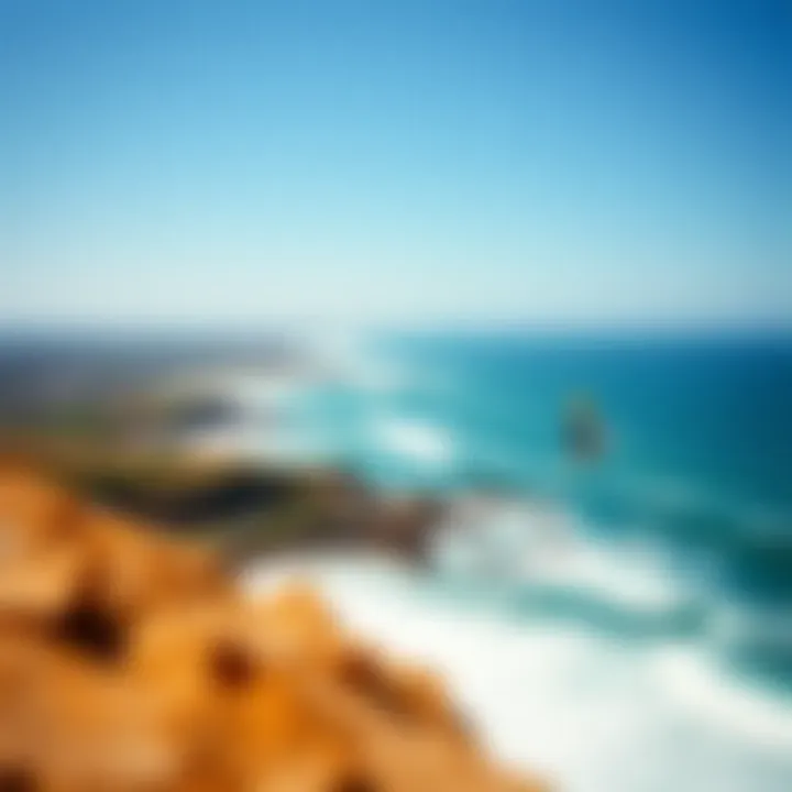 Top Destinations: Where to Windsurf A panoramic view of a popular windsurfing location with clear skies and waves inviting adrenaline seekers